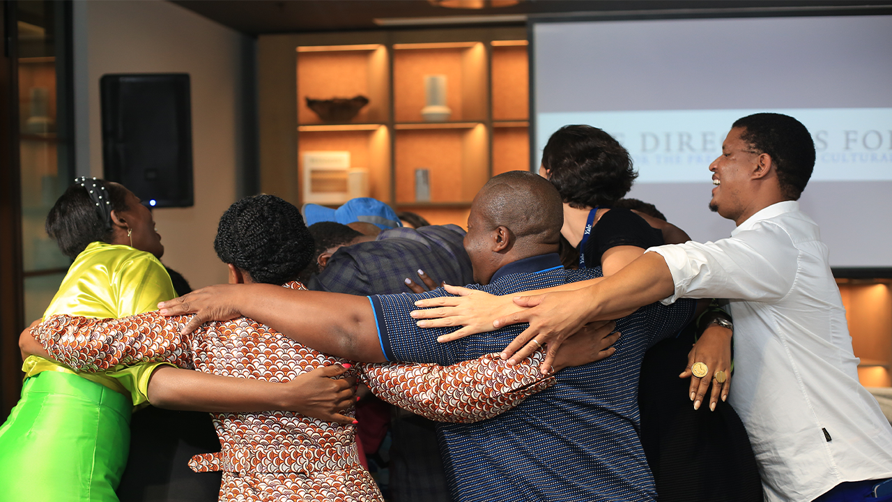 A group hugging.