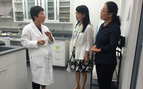 Professors Maqian Nie (Professor of environmental chemistry at Xi'an University of Architecture and Technology) and He Ling (Professor chemistry at Xi'an Jiaotong University compare lecture announcement ) visiting IPCH labs and discussing with Rui Chen