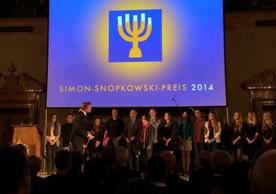 Students of the Rhön-Gymnasium, the Director Edith Degenhardt, and the project leader Günter Henneberger, seen here receiving the Simon Snopkowski Award in the Emperor's Hall of the Munich Residenz, Germany