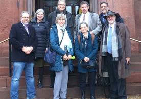 Yale delegation in front of the Smithsonian Castle (L to R): Matthew Jacobson, Laura Wexler, Lynn Cooley, Stefan Simon, Mary Miller, David Skelly and  Richard Bribiescas with Richard Kurin (Under Secretary for History, Art, and Culture, Smithsonian Institution)